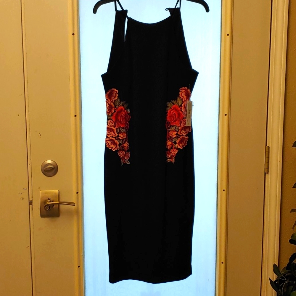 Flower print black dress brand new!  Size 6